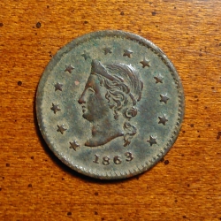 Jeton d’épicerie «J.A. Castle» de la guerre de Sécession de 1863, trouvé par Duane K.