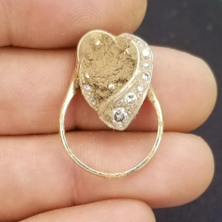 14-Karat-Goldring mit 10 Diamanten, gefunden von John A. und seinem Sohn.